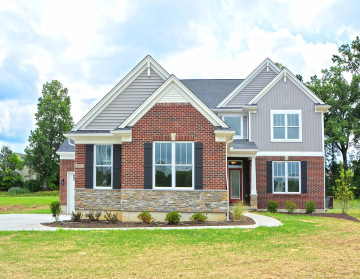 exterior of home with brick and grey paneling by Chris Gorman Homes in Cincinnati, Ohio